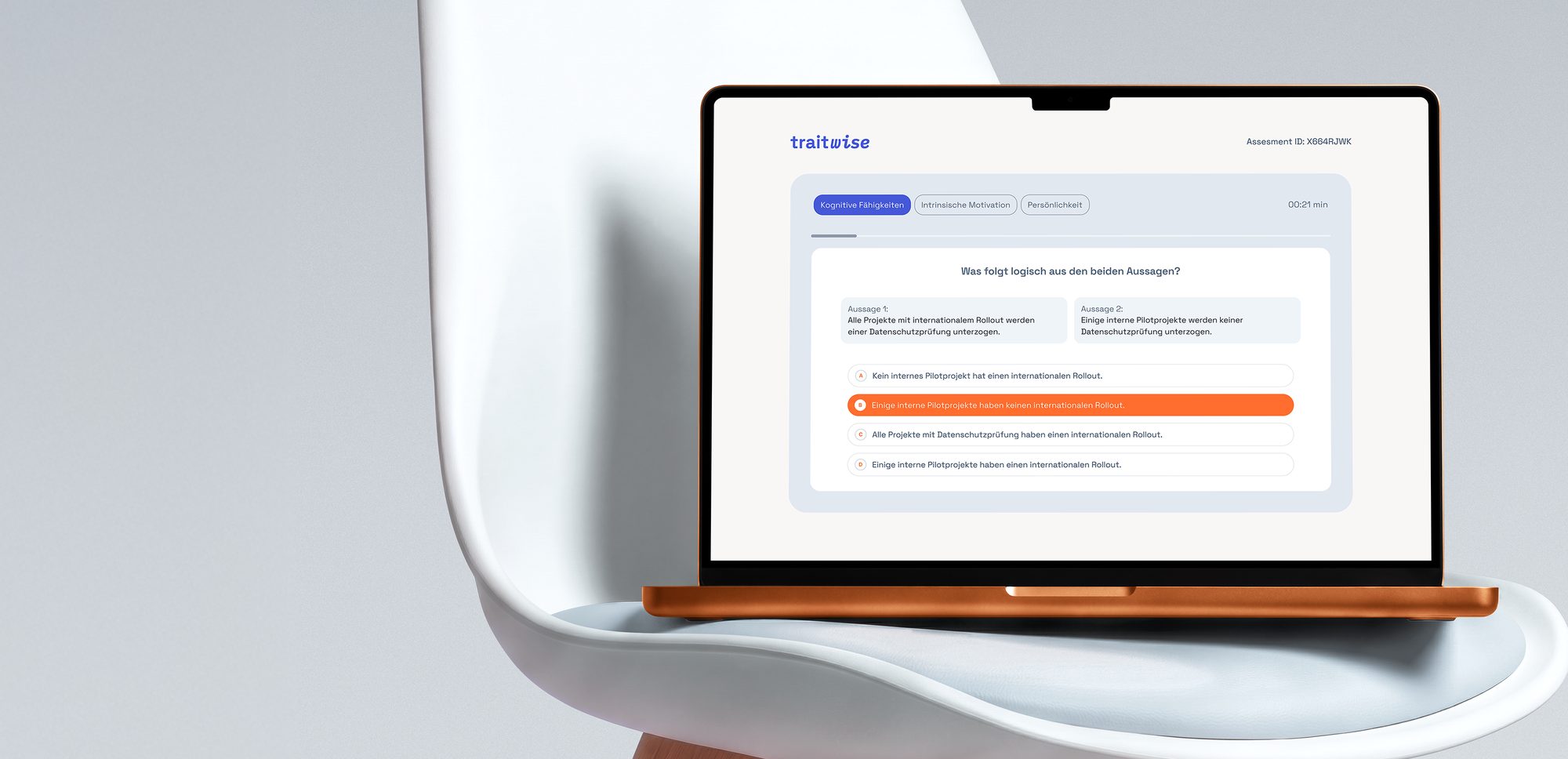MacBook showing a Traitwise assessment task on a chair
